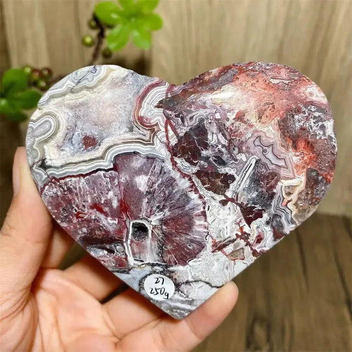 Mexican Agate Crystal Heart for Joy & Emotional Balance, featuring vibrant rainbow bands and sparkling druzy interior.