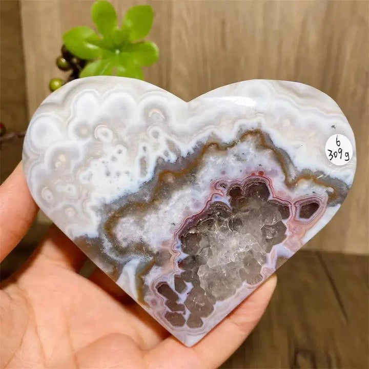 Mexican Agate Crystal Heart for Joy & Emotional Balance. White, brown, and purple banded geode heart with sparkling druzy.