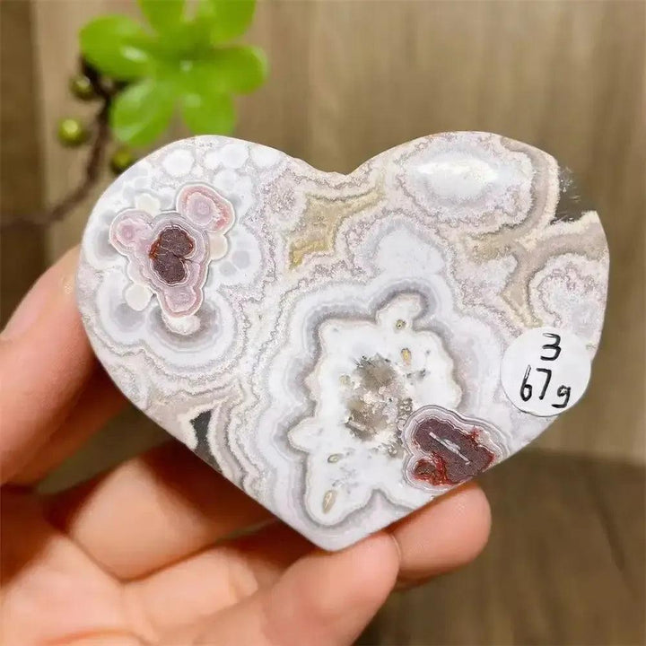 Mexican Agate Crystal Heart for Joy & Emotional Balance. White, pink, purple, and cream banded agate heart.
