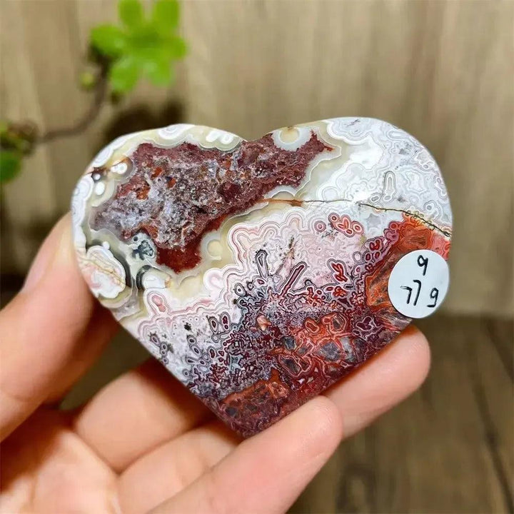 Vibrant Mexican Agate Crystal Heart for Joy & Emotional Balance, featuring red, white, and cream bands.