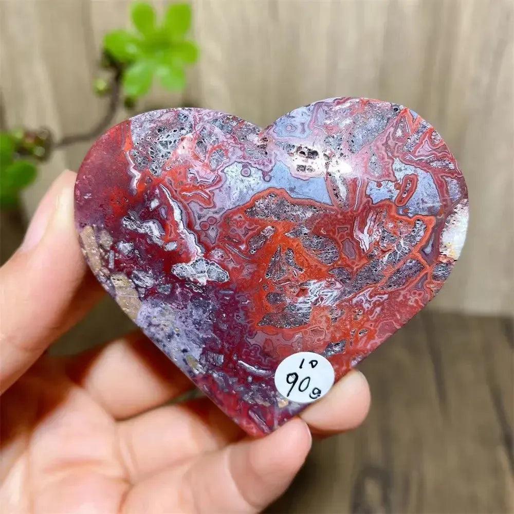 Mexican Agate Crystal Heart for Joy & Emotional Balance, featuring vivid rainbow bands and a sparkling druzy interior.