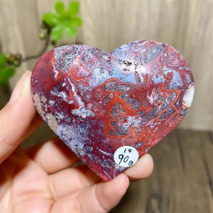 Mexican Agate Crystal Heart for Joy & Emotional Balance, featuring vivid rainbow bands and a sparkling druzy interior.