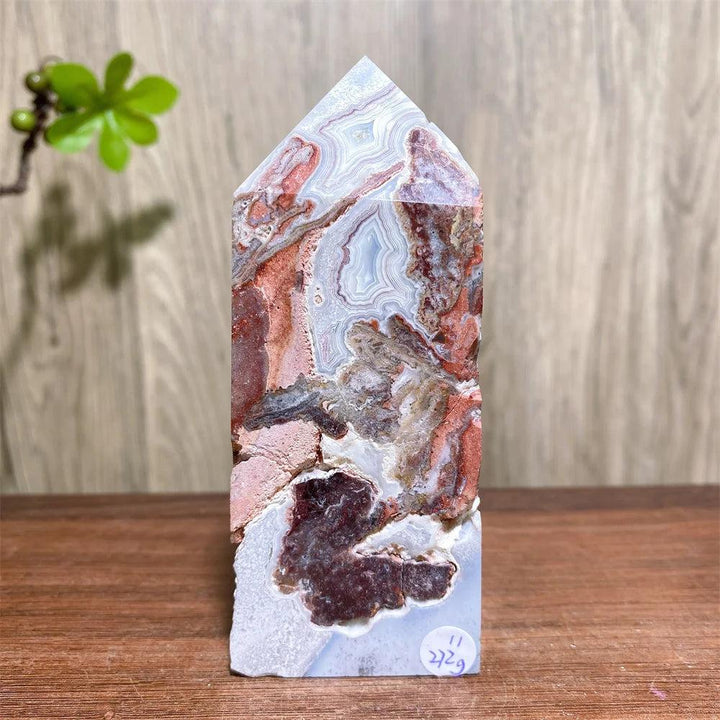 Mexican Agate Crystal Tower: Bold red, cream, rust swirling bands, raw geode base. Grounding & Stability.