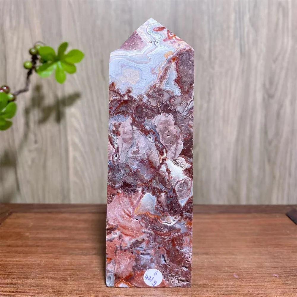 Mexican Agate Crystal Tower with bold swirling bands of deep red, cream, and rust, a grounding raw geode specimen.