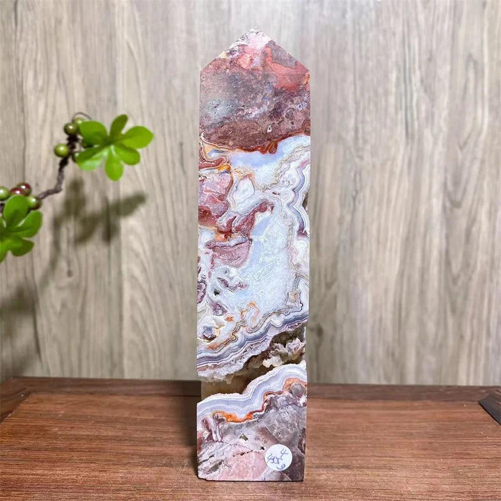 Mexican Agate Crystal Tower: Bold red, cream, rust swirling bands, raw geode, grounding & stability.