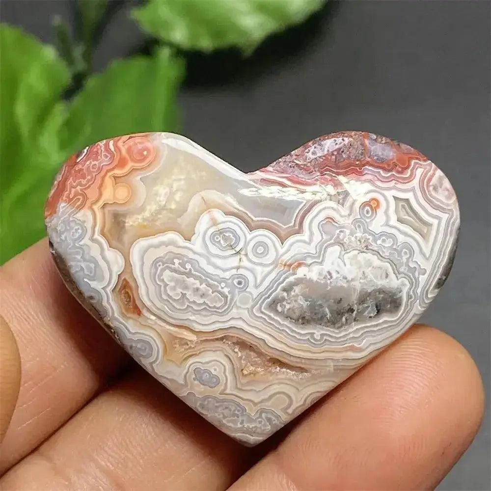 Mexican Striped Agate Crystal Heart: Polished, banded chalcedony with warm earthy tones, grounding and nurturing.