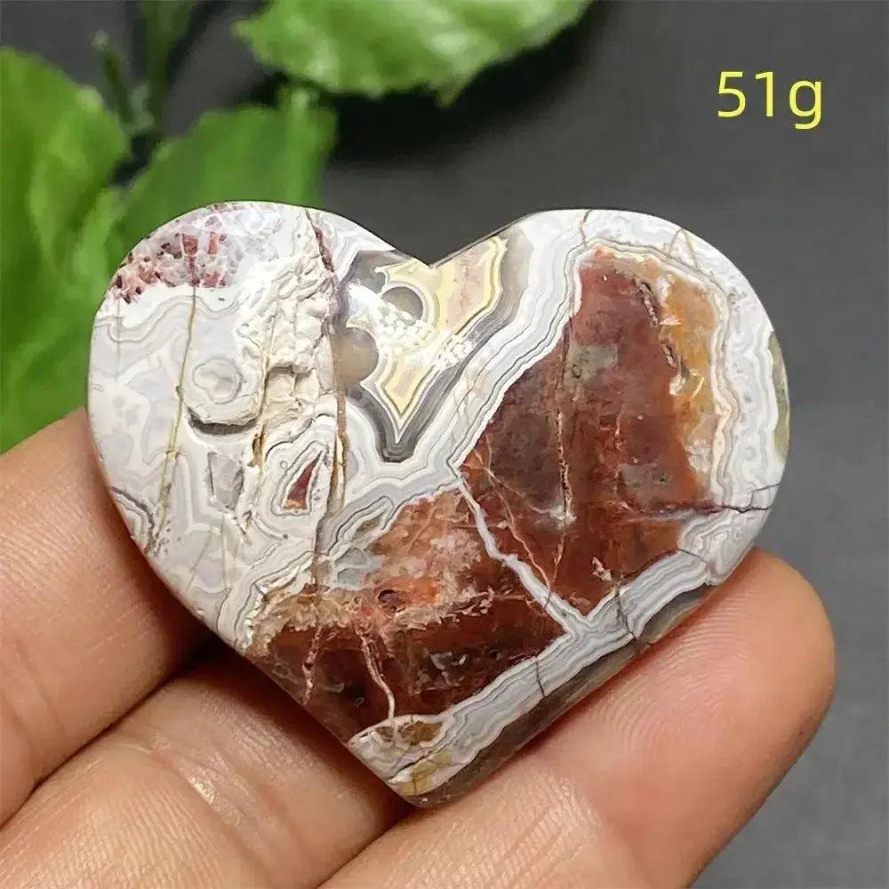 Mexican Striped Agate Crystal Heart, a hand-polished stone with warm earthy tones, parallel bands, and grounding energy.