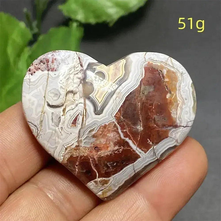 Mexican Striped Agate Crystal Heart, a hand-polished stone with warm earthy tones, parallel bands, and grounding energy.