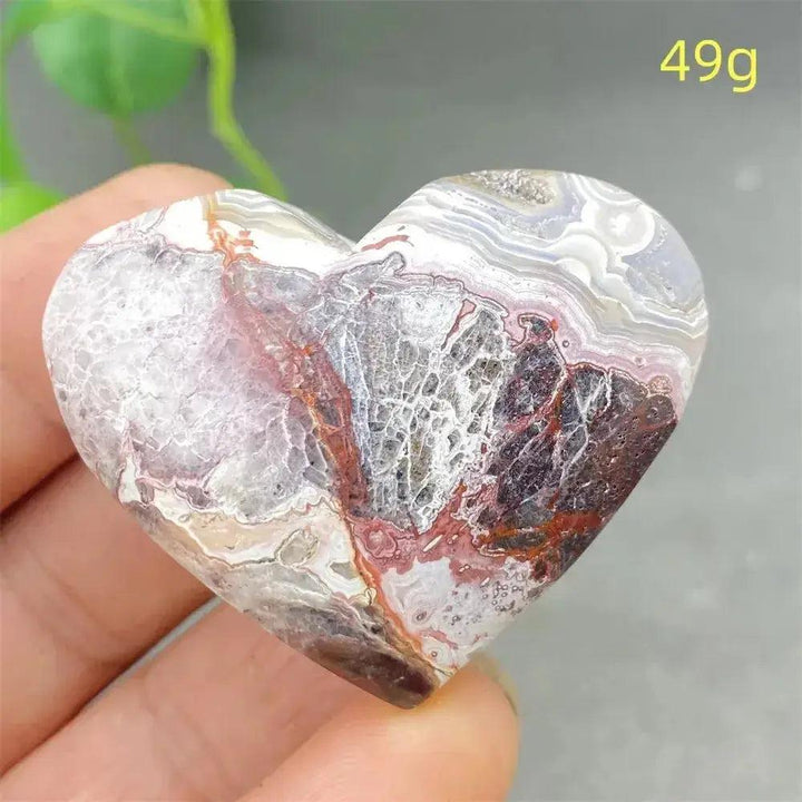 Mexican Striped Agate Crystal Heart, 49g. Polished, banded agate in warm earthy tones for grounding and love.