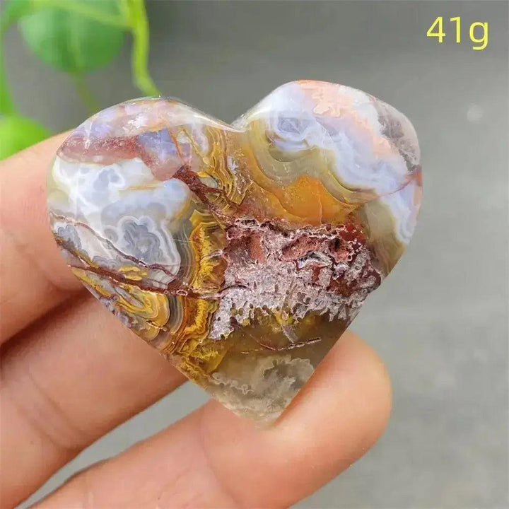 Mexican Striped Agate Crystal Heart, 41g. Polished stone with warm earthy tones, parallel bands, grounding energy.