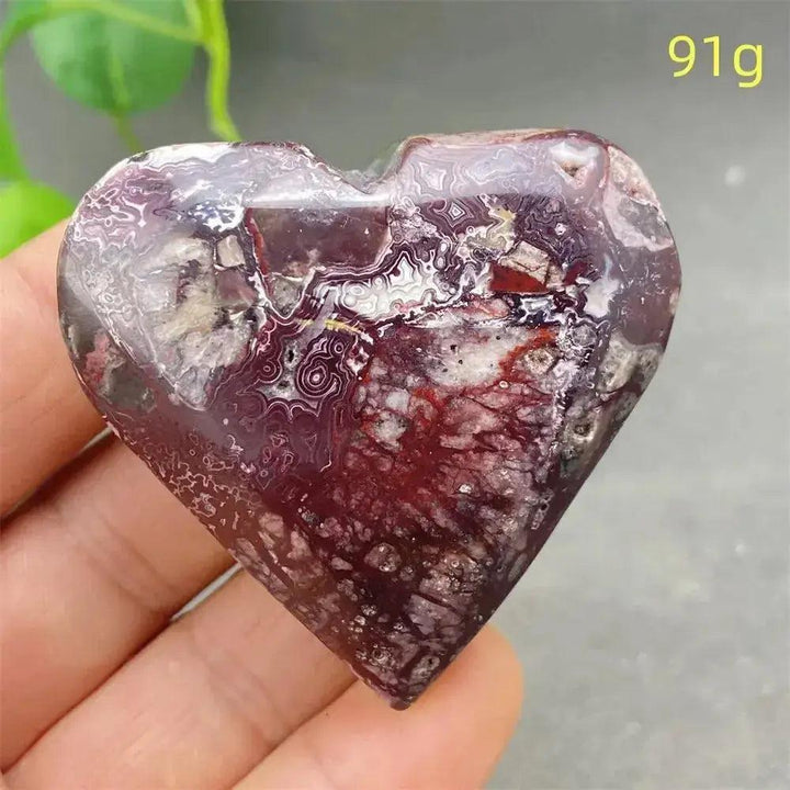 Mexican Striped Agate Crystal Heart: Polished, banded chalcedony with warm earthy tones, grounding and nurturing.