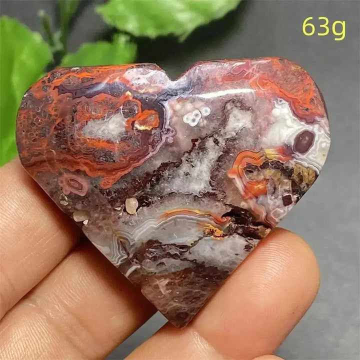 Mexican Striped Agate Crystal Heart, a hand-polished stone with warm earthy tones, parallel bands, and grounding energy.