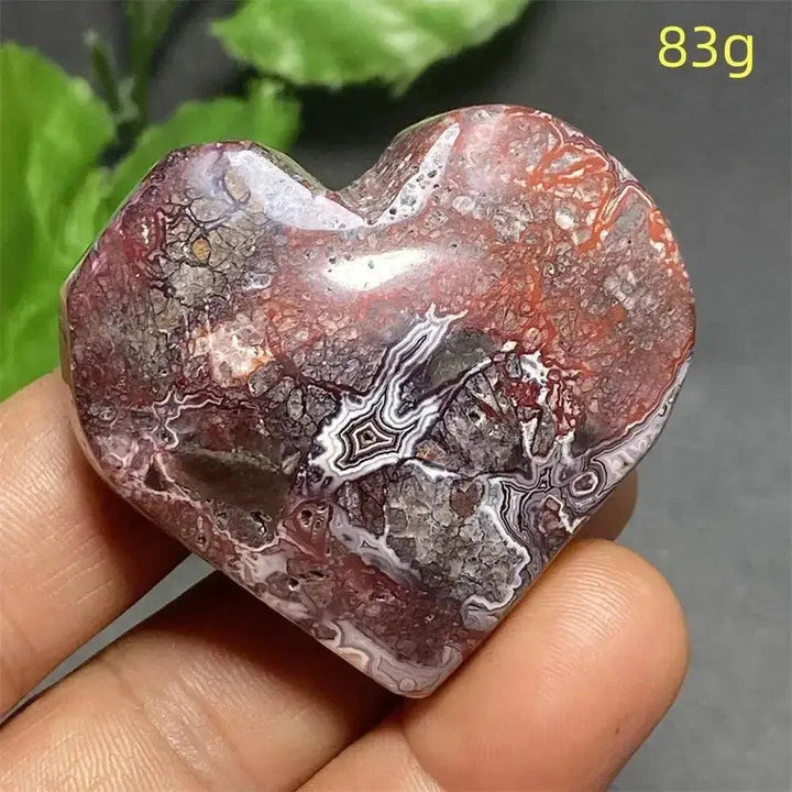 Mexican Striped Agate crystal heart, 83g, with warm earthy tones, parallel banding, and grounding energy.