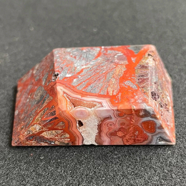 Polished Mexico Agate freeform crystal with vibrant red carnelian patterns, perfect for reiki healing and home decor.