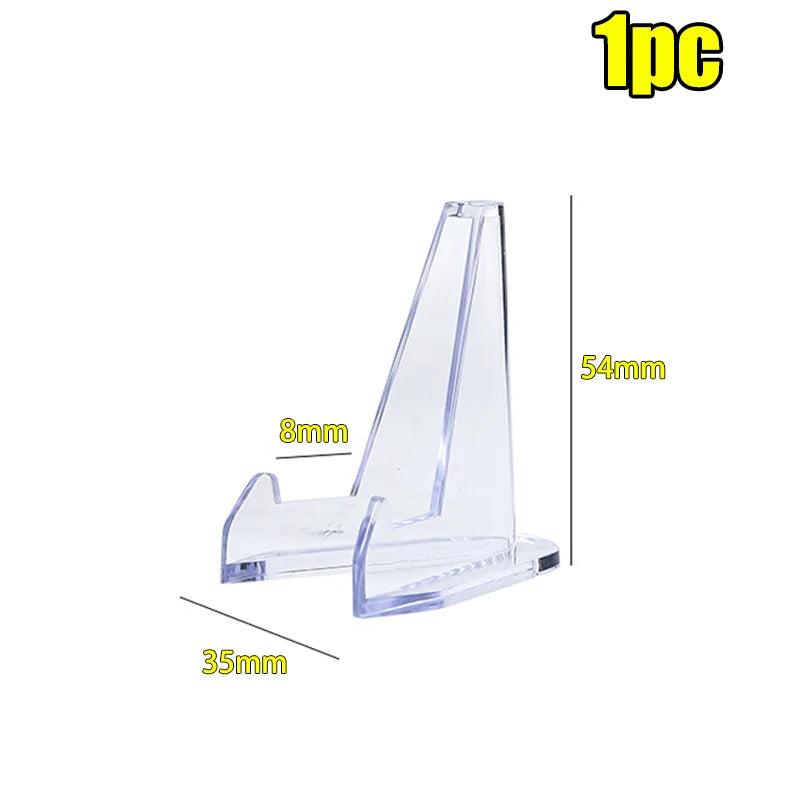 Clear acrylic triangle easel stand, 54x35mm, for displaying crystals like amethyst or quartz.