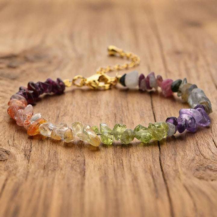 Bohemian Mixed Gemstone Crystal Chip Chakra Bracelet with Garnet, Amethyst, Peridot, and more.