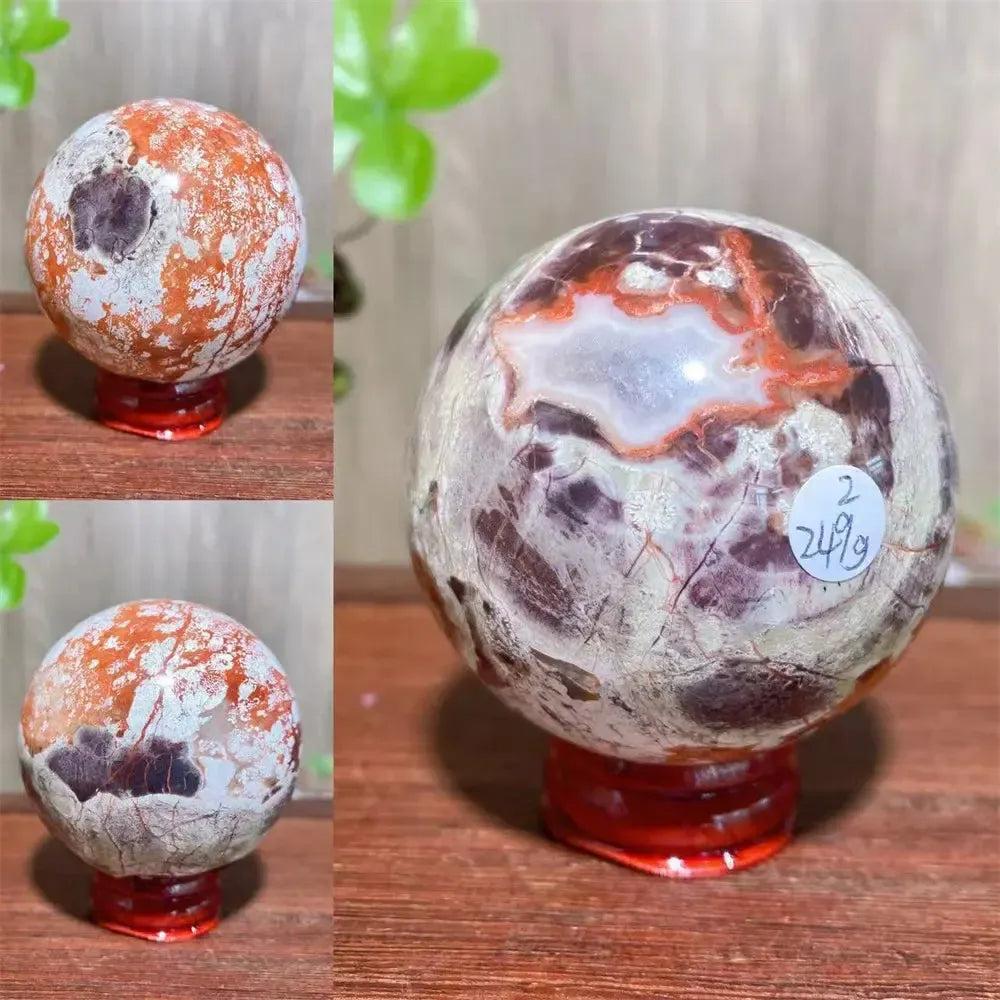 Polished Money Agate Crystal Sphere, a substantial abundance stone with vibrant gold, rust, and cream banding.