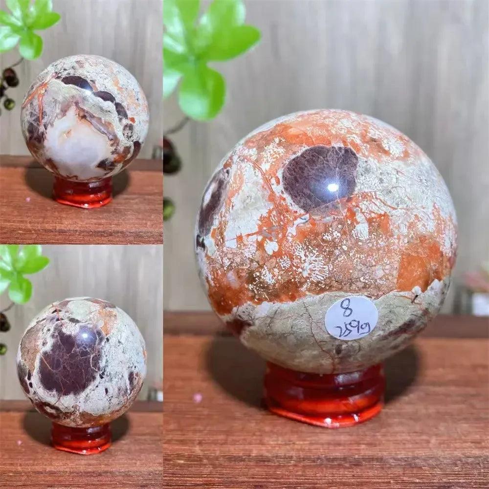 Money Agate Crystal Sphere: Polished abundance stone with vibrant gold, rust, cream, and warm brown banding.