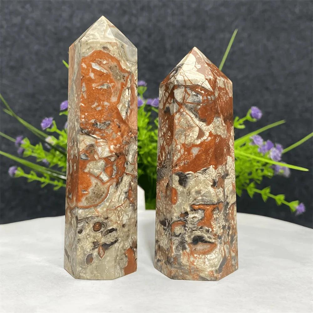 Two Money Agate Crystal Towers in earthy red and grey tones for grounding and abundance.