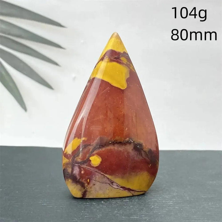 Mookaite Jasper torch freeform from Crystal Destiny, 104g, 80mm, with red, yellow, and burgundy swirls.