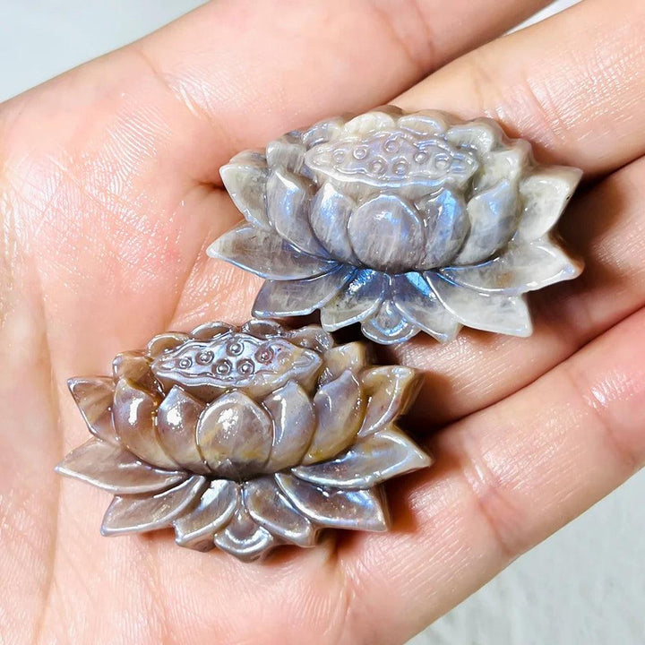 Two hand-carved Moonstone lotus flowers with luminous adularescence, perfect for meditation and spiritual peace.