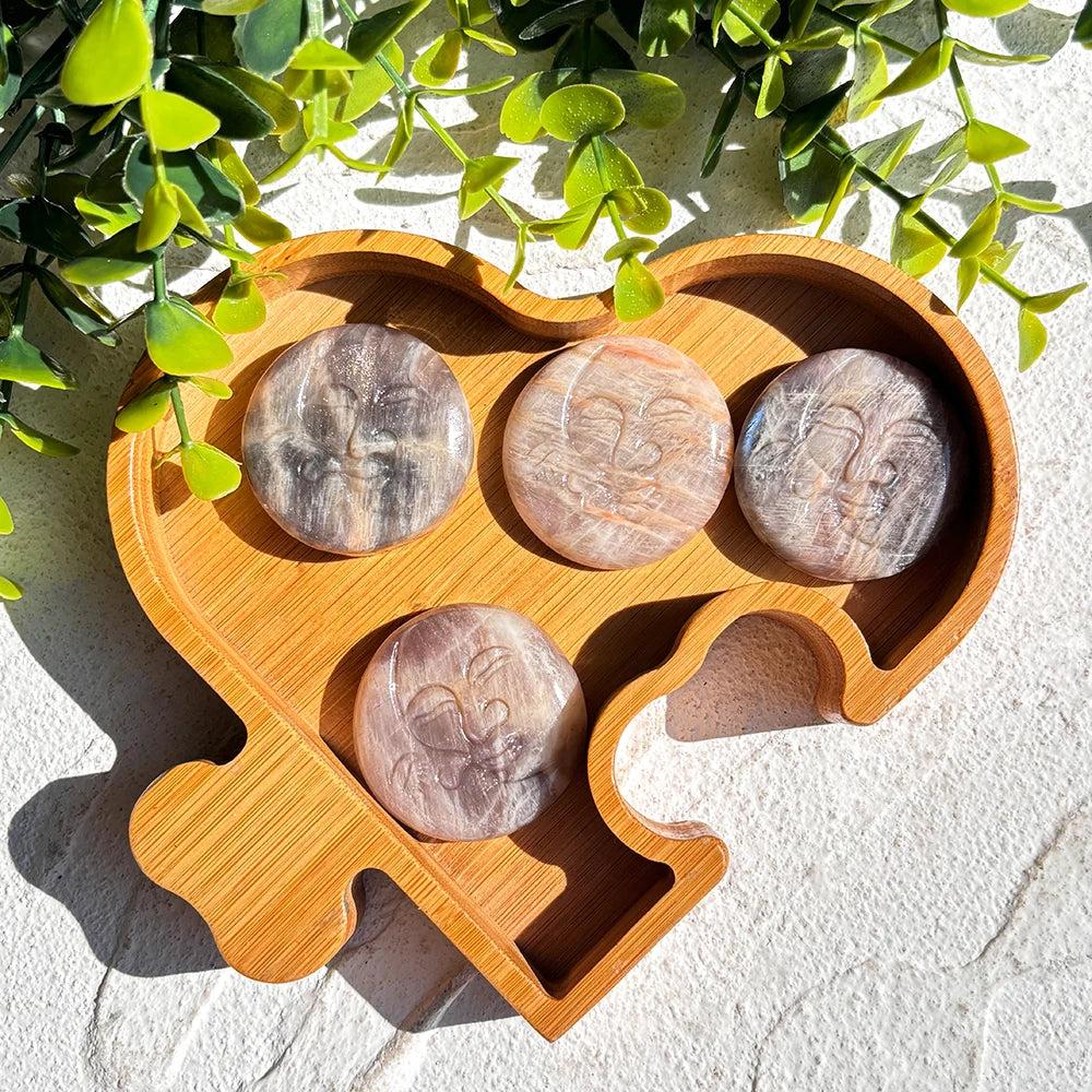 Moonstone Crystal Sun and Moon Face Carving, showcasing pearlescent glow and intuitive wisdom.