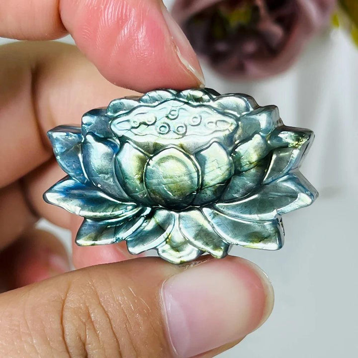 Hand-carved Labradorite Crystal Lotus Flower, shimmering with iridescent blues and greens for growth and transformation.