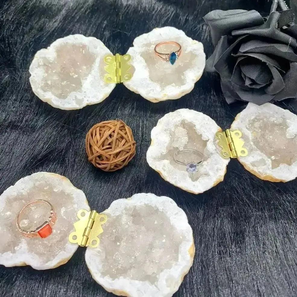 Crystal Destiny Moroccan Agate geode ring boxes with sparkling druzy quartz, brass hinges, and rings.