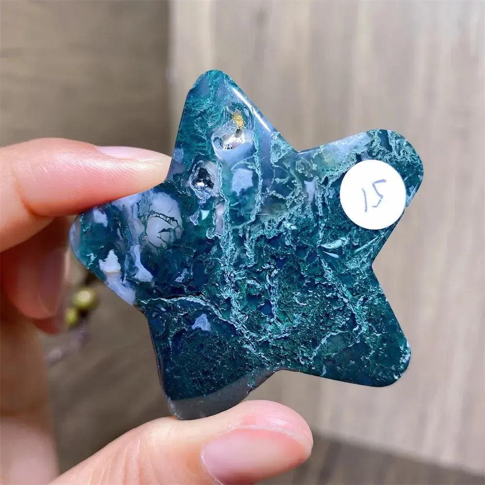 Hand-carved Moss Agate Star Crystal Carving, a natural green healing stone for new beginnings and abundance.