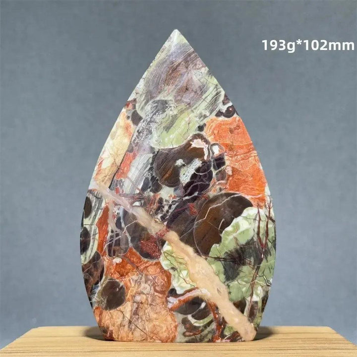 Moss Agate freeform torch from Crystal Destiny, featuring green dendritic inclusions and natural upward energy flow.