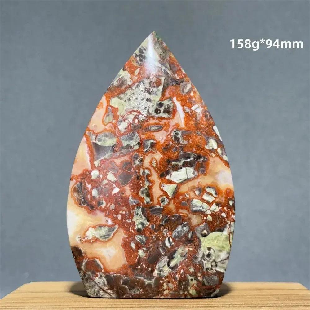 Moss Agate freeform torch from Crystal Destiny, featuring green dendritic inclusions and natural upward energy flow.