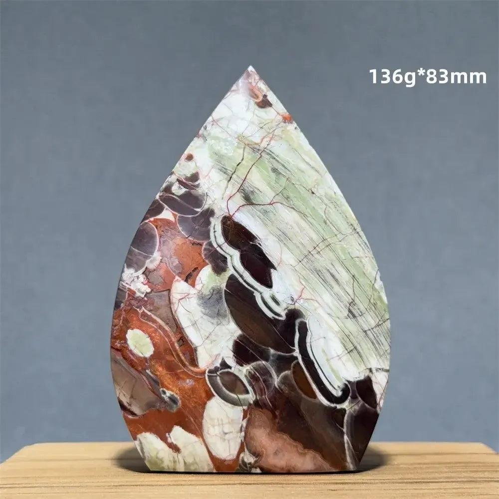 Natural Moss Agate freeform torch from Crystal Destiny, featuring green, white, and reddish-brown dendritic inclusions.