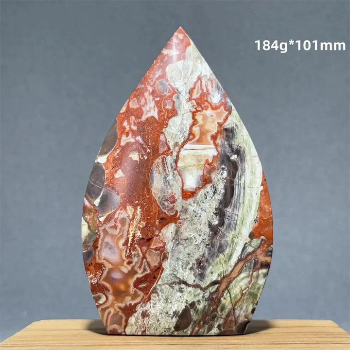 Large, teardrop-shaped Moss Agate freeform torch with red, green, white, and brown dendritic inclusions from Crystal Destiny.