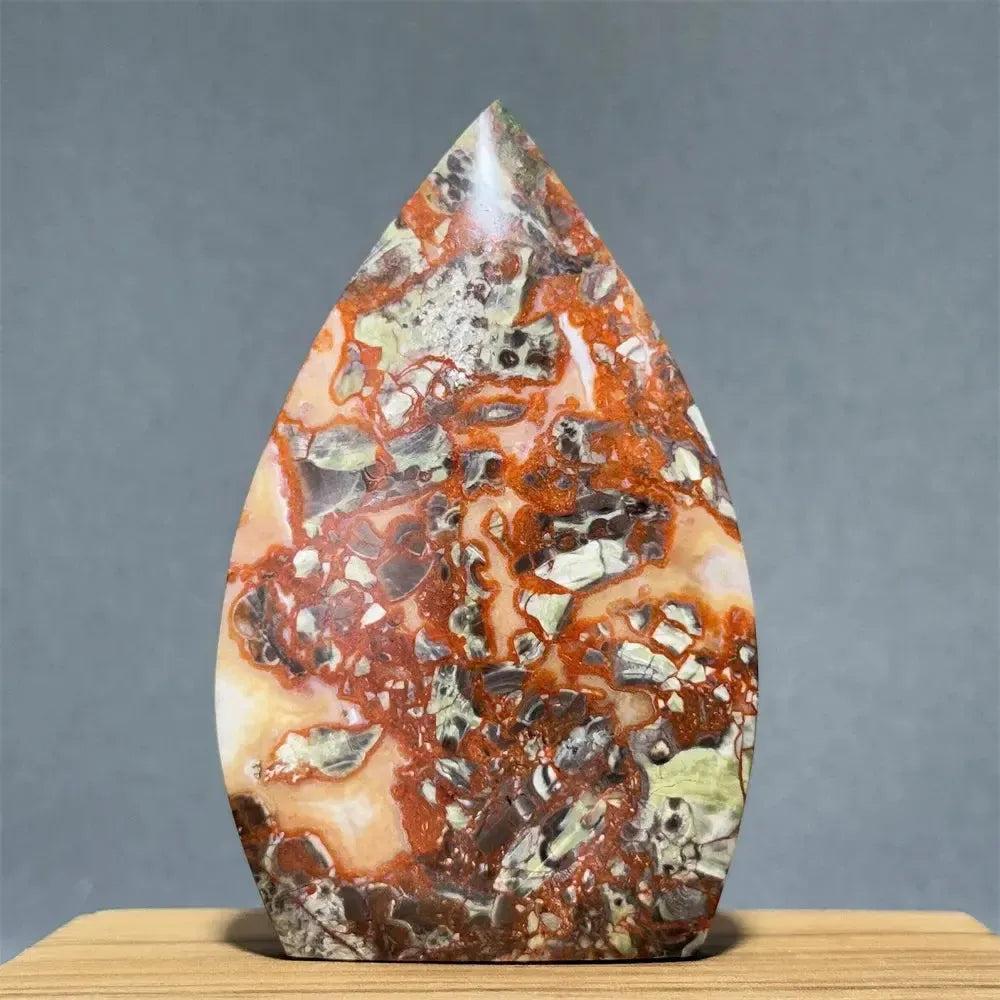 Natural Moss Agate freeform torch from Crystal Destiny, featuring green dendritic inclusions and a unique landscape pattern.