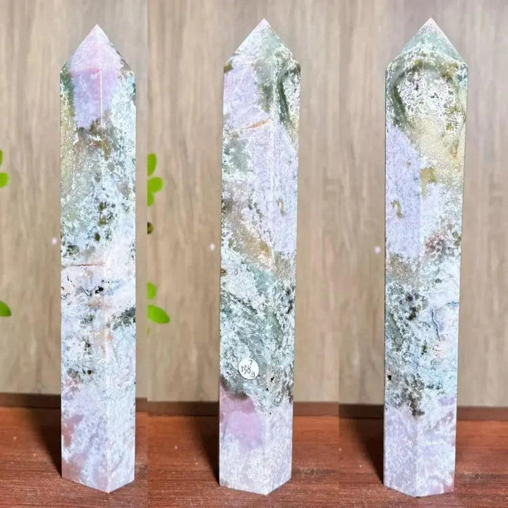 Moss Agate Ocean Jasper Crystal Tower: Polished, tall, multi-faceted tower with lush green, white, and purple inclusions.