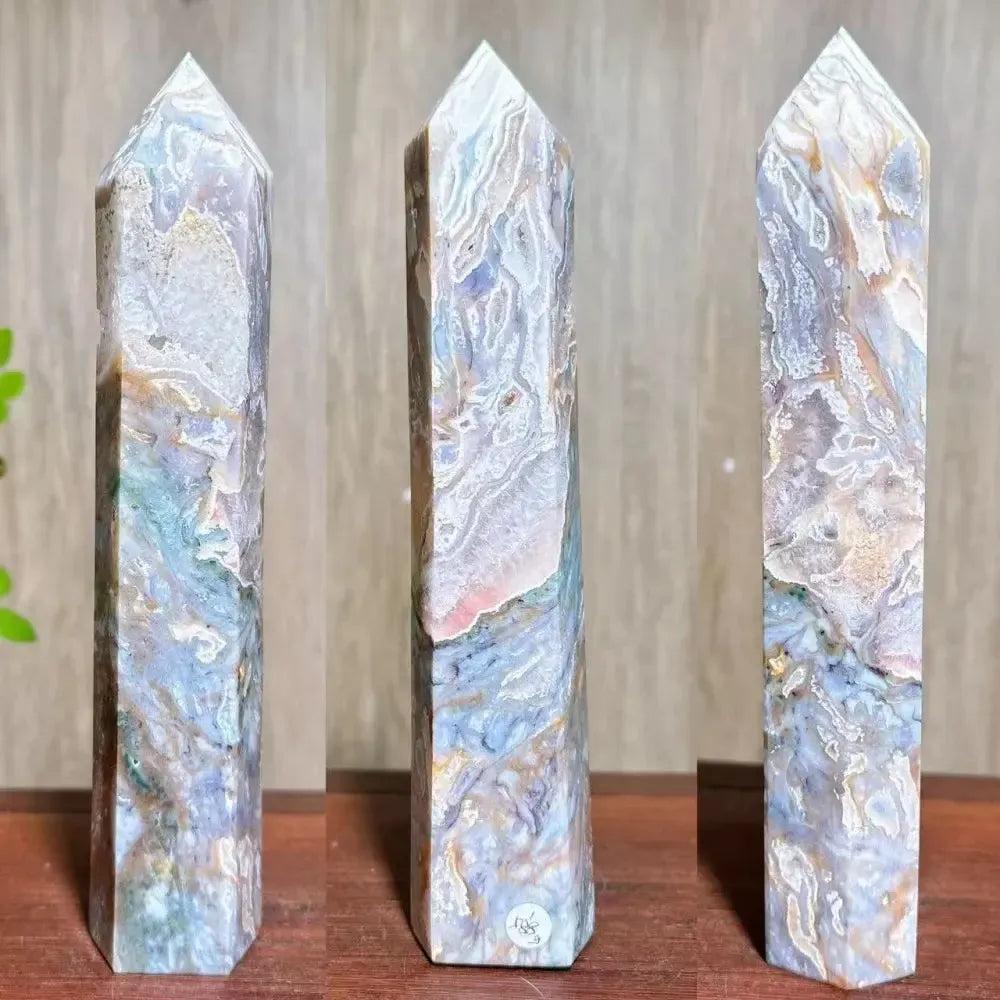 Moss Agate Ocean Jasper Crystal Tower: Polished, tall hexagonal crystal with lush green, blue, and purple inclusions.