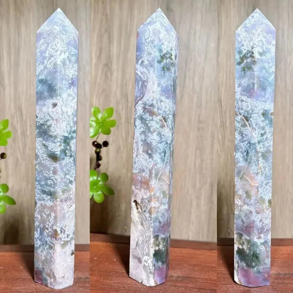 Moss Agate Ocean Jasper Crystal Tower: Polished, tall crystal with lush green inclusions and vivid orbs for growth and joy.