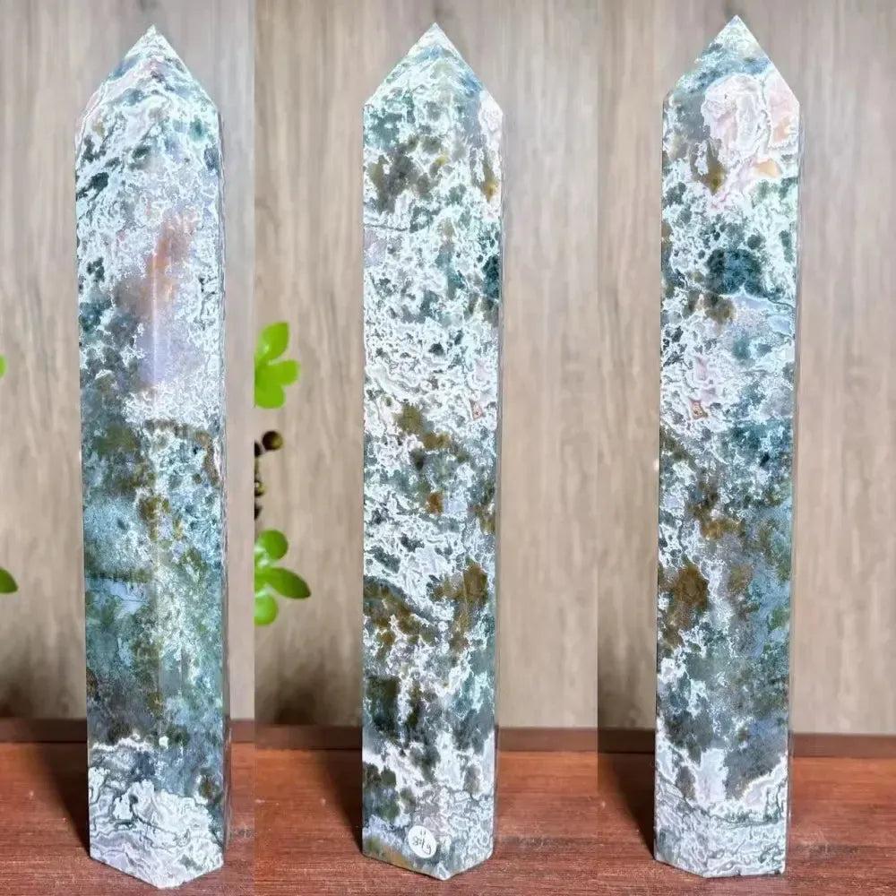 Moss Agate Ocean Jasper Crystal Tower: Polished green and white crystal with druzy pockets, promoting growth and joy.