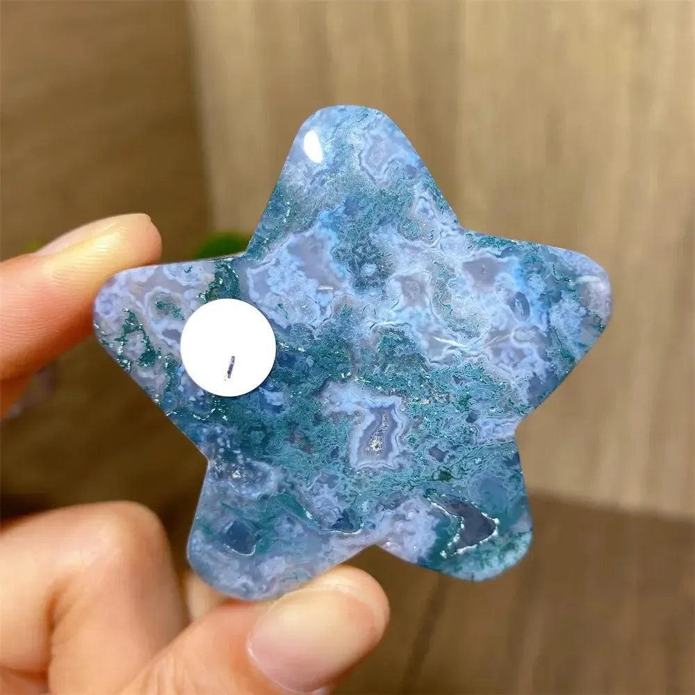 Hand-carved blue and green moss agate star crystal from Crystal Destiny, showcasing unique inclusions.