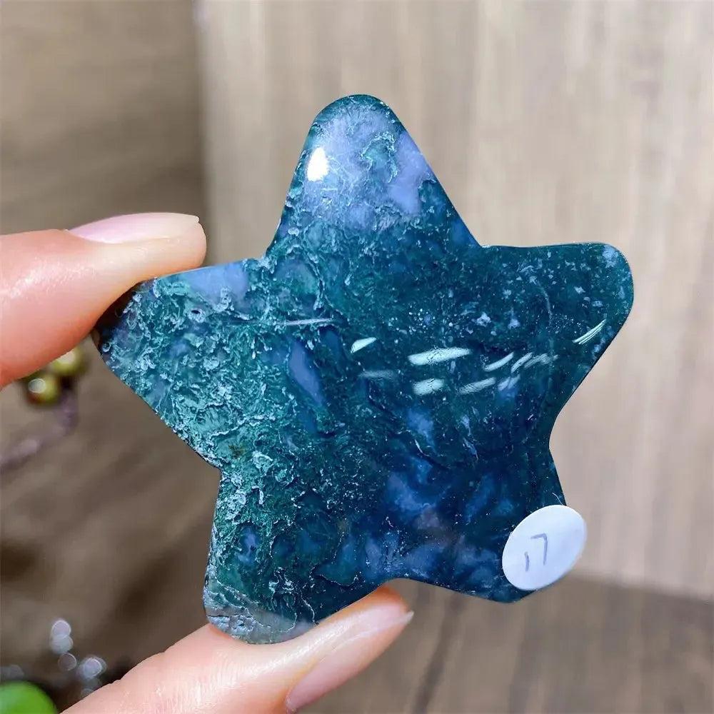 Hand-carved green moss agate star crystal from Crystal Destiny, showcasing unique forest-like inclusions.