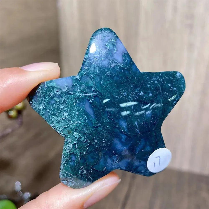 Hand-carved green moss agate star crystal from Crystal Destiny, showcasing unique forest-like inclusions.