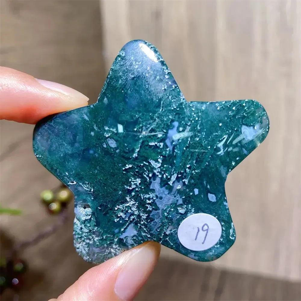 Hand-carved green moss agate star crystal from Crystal Destiny, showcasing unique forest-like inclusions.