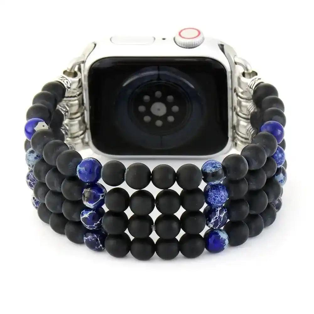 Crystal Destiny multi-row matte black onyx and blue sea sediment jasper Apple Watch band for grounding.