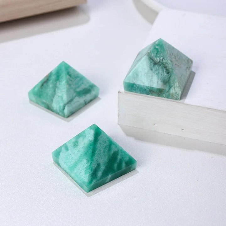 Natural Amazonite Crystal Pyramid for Healing and Calm, featuring three soft blue-green amazonite pyramids.