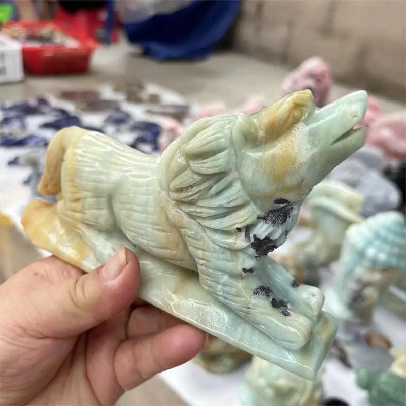 Polished Amazonite wolf carving in light blue-green and beige, ideal for home decor and healing.