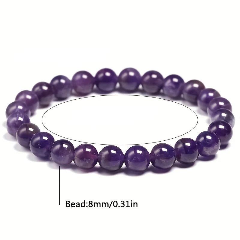 Natural Amethyst Beaded Bracelet with 8mm deep violet round beads on an elastic band for peace and tranquility.