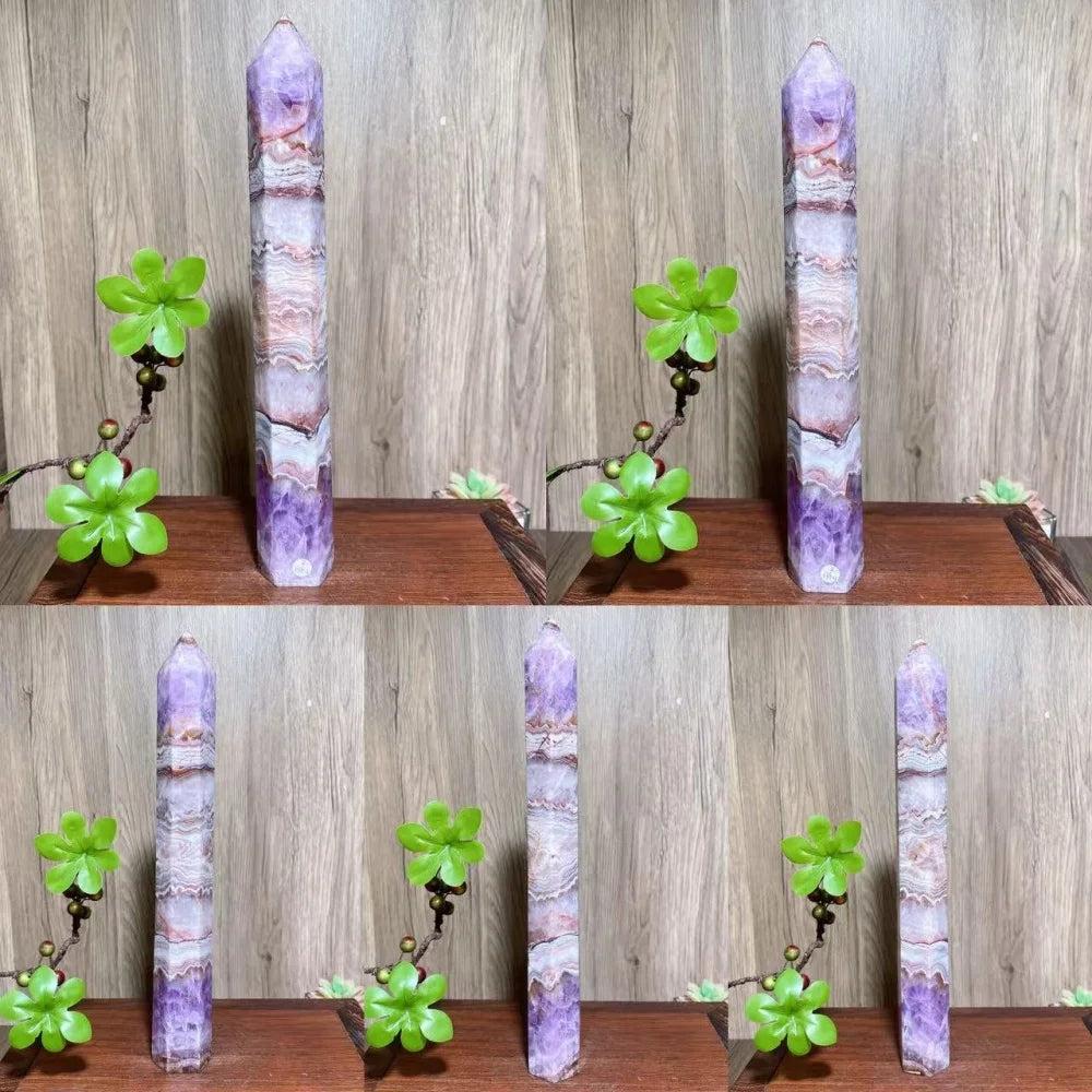 Natural amethyst skinny tower crystal with purple and white bands, ideal for healing and home decor.