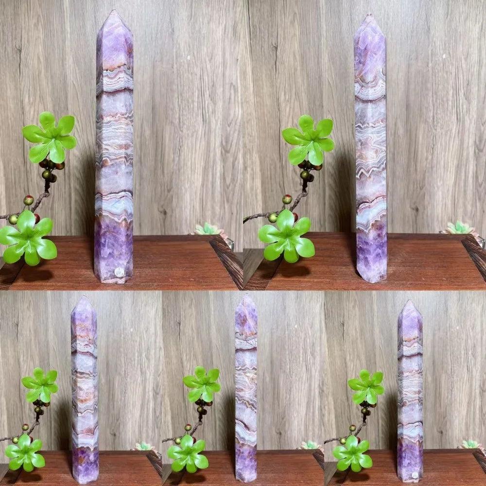 Natural amethyst skinny tower crystal with purple and white bands, ideal for healing and home decor.