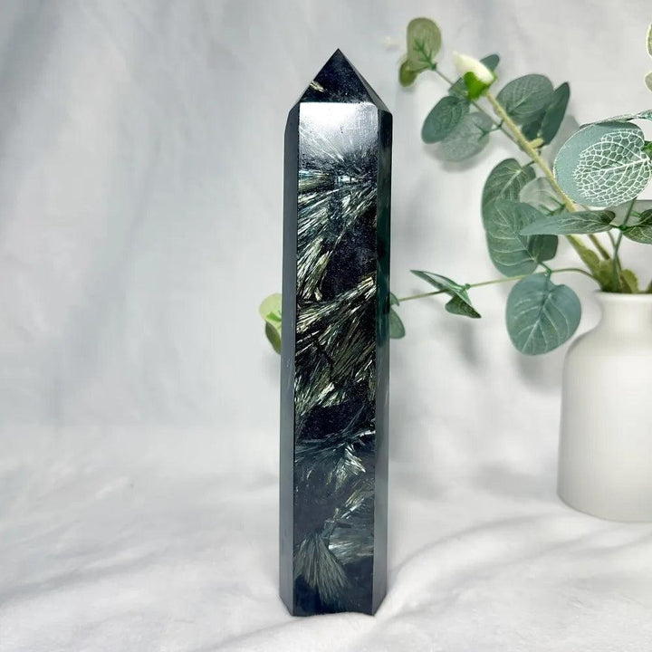 Natural Astrophyllite Tower with Arfvedsonite Flash. Dark matrix, metallic golden-bronze blades, electric blue-green flashes.