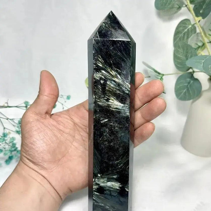 Natural Astrophyllite Tower with Arfvedsonite Flash. Dark matrix, golden-bronze blades, electric blue-green flashes.